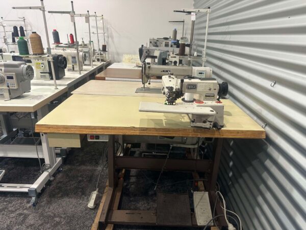 Blind hemming machine