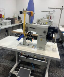 Post bed sewing machine for cap